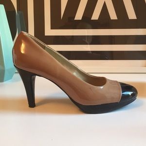 Nude patent cap-toe pumps